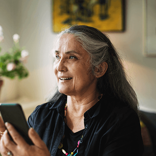 Women_with_mobile_460x460px.png